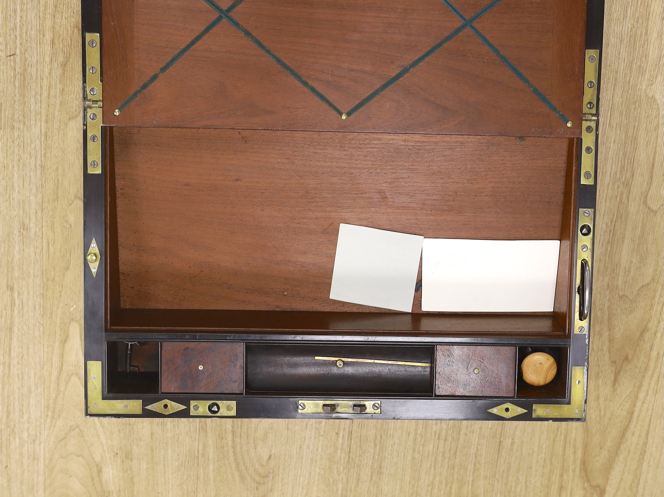 A George III mahogany, ebony and brass-mounted ship's writing box by Wells & Co., screw fixings to each side with original key, 50.5cm x 30cm x 19.5cm